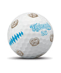 TaylorMade TP5 Pix Oktoberfest golf balls with pretzel design, premium golf ball featuring vibrant colors and detailed print.
